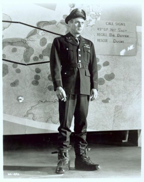 Steve McQueen (as Buzz Rickson), full body shot.